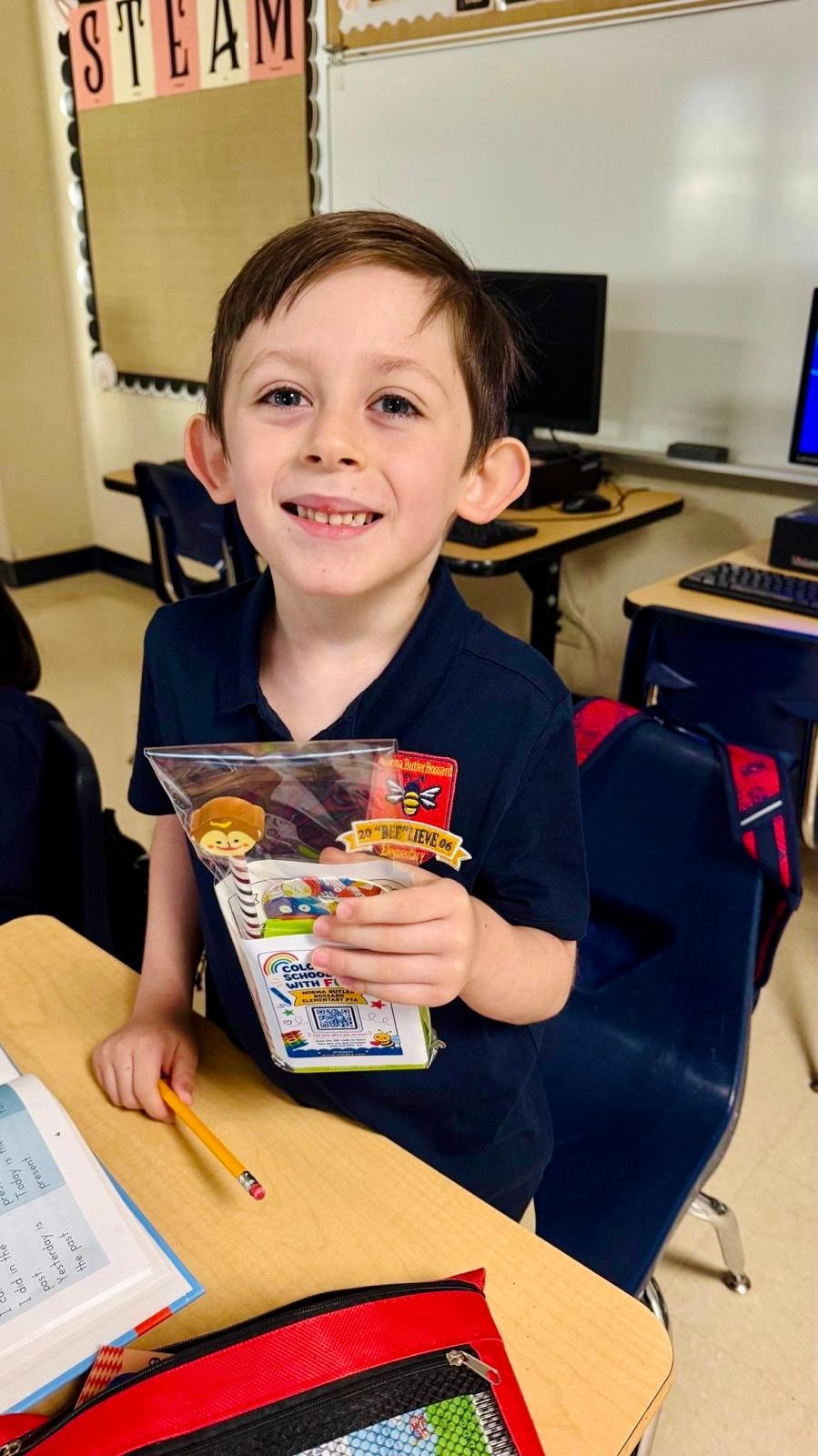 Student receiving a PTA welcome gift